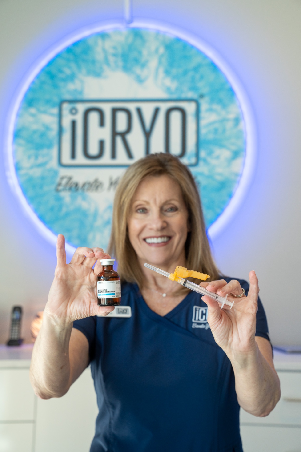 iCRYO Okatie-Bluffton registered nurse holding glutathione IM shot vial and syringe